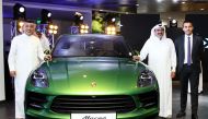 Salman Jassem Al Darwish, Chairman and CEO of Porsche Centre Doha, and other officials at the launch of the all new Macan at the Porsche Centre in The Pearl-Qatar yesterday. 
Pic: Qassim Rahmatullah / The Peninsula. 