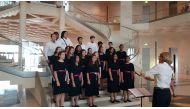 Qatar Youth Choir in performance with conductor Alena Pyne