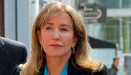 Actor Felicity Huffman, facing charges in a nationwide college admissions cheating scheme, enters federal court in Boston, Massachusetts, U.S., April 3, 2019. Reuters/Brian Snyder
