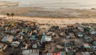 Destroyed  buildings which stood in the path of Cyclone Idai can be seen in this aerial photograph on April 01, 2019 over the Praia Nova neighbourhood in Beira. AFP / Guillem Sartorio
 