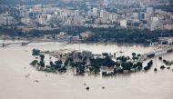 An aerial view taken on April 09, 2019 shows the Karun River which has burst its banks in Ahvaz, the capital of Iran's southwestern province of Khuzestan which has been badly affected by flooding over the past few weeks.  AFP / ATTA KENARE
