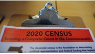An informational pamphlet is displayed at an event for community activists and local government leaders to mark the one-year-out launch of the 2020 Census efforts in Boston, Massachusetts,  April 1, 2019. Reuters/Brian Snyder