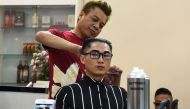 Representative image: Vietnamese man Nguyen Huu Thien gets a Kim Jong Un style haircut at a saloon in Hanoi on February 20, 2019. AFP/Nhac Nguyen
