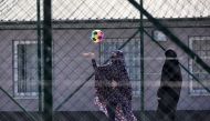 Kosovar children returned from Syria play in the compound of the foreign detention center in the village of Vranidoll on April 21, 2019.  AFP / Armend NIMANI