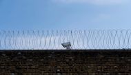 CCTV cameras are seen at Wandsworth prison in southwest London on April 12, 2019. AFP/Niklas Hallen
