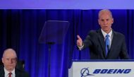 Boeing Co Chief Executive Dennis Muilenburg speaks, as Boeing Vice-President and Corporate Secretary Grant Dixton (L) looks on, during the general annual shareholder meeting at the Field Museum in Chicago, Illinois, U.S., April 29, 2019. Jim Young/Pool vi