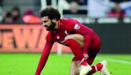  Liverpool's Mohamed Salah reacts after sustaining an injury. Reuters/Scott Heppell
