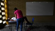 REPRESENTATIVE IMAGE:  Colombian medical doctor of the San Raffaele hospital ship, Durley Maya, checks a pregnant woman at a classroom improvised as office in Isla Mono, in the San Juan river, Choco department, Colombia, on April 23, 2019.  AFP / Raul Arb
