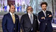 Italian luxury designer Stefano Ricci (C) poses with his sons Niccolo (R) and Filippo, during a preview of his Spring/Summer 2020 collection, at 'Reggia di Caserta', a UNESCO world heritage site and one of the great Royal Palaces of Europe, in Caserta nea