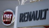 FILE PHOTO: The logos of Renault and Fiat carmakers are seen in Nice, France, June 3, 2019. REUTERS/Eric Gaillard
