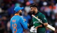  India's Virat Kohil shakes hands with Pakistan's Shadab Khan after the match Action Images via Reuters/Andrew Boyers