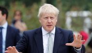 Boris Johnson, a leadership candidate for Britain's Conservative Party, arrives for a walkabout at Wisley Garden Centre in Surrey, Britain, June 25, 2019. REUTERS/Peter Nicholls