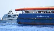 The migrant search and rescue ship Sea-Watch 3 carrying stranded migrants, sails near the island of Lampedusa, Italy, June 26, 2019. REUTERS/Guglielmo Mangiapane