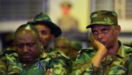 Members of the Ethiopian army mourn during the National funeral service, at the millennium hole in Addis Ababa, of Chief of Staff of the Ethiopian defence forces Seare Mekonnen and of Major-General Geza'e Abera, a retired former senior official in the Eth