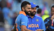 India's Rohit Sharma (R) is interviewed by India's captain Virat Kohli (L) on the pitch after India's victory in the 2019 Cricket World Cup group stage match between Sri Lanka and India at Headingley in Leeds, northern England, on July 6, 2019. (AFP / Dib