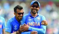 India's Ravindra Jadeja (L) shares a light moment at the end of the first innings during the 2019 Cricket World Cup first semi-final between New Zealand and India at Old Trafford in Manchester, northwest England, on July 10, 2019. AFP / Dibyangshu Sarkar