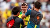 Australia's Alex Carey is wrapped in a bandage after sustaining an injury earlier in the match Action Images via Reuters/Andrew Boyers