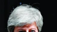 Britain's Prime Minister Theresa May leaves 10 Downing Street in London on July 10, 2019, ahead of the weekly Prime Minister's Questions (PMQs) question and answer session in the House of Commons.  AFP / Tolga Akmen
