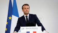French President Emmanuel Macron speaks at the residence of French Defense Minister on the eve of Bastille Day in Paris, France, July 13, 2019. Kamil Zihnioglu/Pool via REUTERS