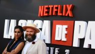 Spanish actress Alba Flores (L) and Serbian actor Darko Peric pose during a photocall for the presentation of the third season of the Spanish TV show
