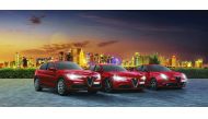 Alfa Romeo model cars seen showcased at an event.