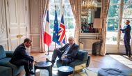 French President Emmanuel Macron and British Prime Minister Boris Johnson speak during a meeting at the Elysee Palace in Paris, France, August 22, 2019. Christophe Petit Tesson/Pool via REUTERS
