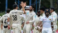 New Zealand's cricketer William Somerville (C) celebrates with his teammates after dismissing Sri Lanka's Kusal Mendis (2R) during the last day of the final Test cricket match between Sri Lanka and New Zealand at P. Sara Oval cricket stadium in Colombo on