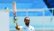 Hanuma Vihari of India celebrates his century during day 2 of the 2nd Test between West Indies and India at Sabina Park, Kingston, Jamaica, on August 31, 2019. AFP / Randy Brooks