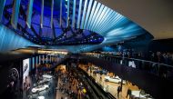 (FILES) In this file photo taken on September 16, 2015 people mill around new cars displayed at the Mercedes Benz hall during the second press day of the 66th IAA auto show in Frankfurt am Main, western Germany. AFP / Odd ANDERSEN