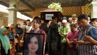 People carry the coffin of Alfiani Hidayatul Solikah, a cabin crew of Lion Air flight JT610, during the funeral at Mojorejo village in Madiun, Indonesia, November 14, 2018. Antara Foto / Siswowidodo /  Reuters