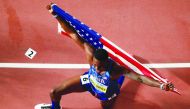 Grant Holloway of the US celebrates after winning gold medal.
