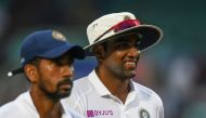 India's Ravichandran Ashwin (R) leaves the ground after taking 5 wickets in their innings during the third day's play of the first Test match between India and South Africa at the Dr. Y.S. Rajasekhara Reddy ACA-VDCA Cricket Stadium in Visakhapatnam on Oct