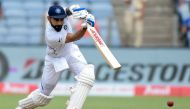 India's captain Virat Kohli plays a shot on the second day of the second Test cricket match between India and South Africa at the Maharashtra Cricket Association Stadium in Pune on October 11, 2019. (AFP / PUNIT PARANJPE)