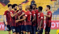 Al Rayyan’s players celebrate a goal against Qatar SC yesterday.  