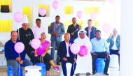 Sealine Beach Resort officials pose for a group photo.