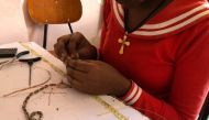 A woman rescued from prostitution makes jewellery from bullet casings at Ethiopian social enterprise Ellilta Products in Addis Ababa,October 22, 2019. Thomson Reuters Foundation/Belinda Goldsmith