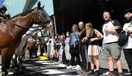 Climate change protesters attempting to blockade link arms in front of ploice horses at the International Mining and Resources Conference (IMARC) being held in Melbourne on October 29, 2019. More than 40 protesters were arrested and four policemen injured