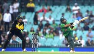 Pakistan's Muhammad Rizwan (R) plays a shot during the Twenty20 cricket match between Australia and Pakistan at the Sydney Cricket Ground in Sydney on November 3, 2019