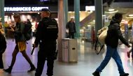 Dutch police patrol at Amsterdam's Schiphol airport after a suspicious incident proved to be a false alarm, Netherlands November 6, 2019. REUTERS/Piroschka van de Wouw