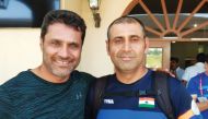 Skeet shooters, Qatar’s Nasser Saleh Al Attiyah and India’s Mairaj Ahmed Khan pose for a picture at the losail Shooting Range yesterday.