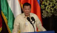(FILES) This file photo taken on October 18, 2019 shows Philippine President Rodrigo Duterte speaking during a joint press conference with his Indian counterpart at the Malacanang Palace in Manila. AFP / Ted Aljibe 
