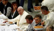 Pope Francis attends a lunch with the poor after celebrating a Mass marking the Roman Catholic Church's World Day of the Poor, in Paul VI Hall at the Vatican, November 17, 2019. Reuters/Guglielmo Mangiapane  
