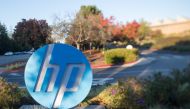 In this file photo taken on November 4, 2016 the HP logo is seen on a sign at Hewlett Packard's headquarters in Palo Alto, California. 
/ AFP / JOSH EDELSON
