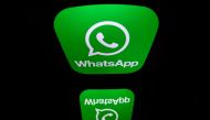 The logo of WhatsApp mobile messaging service in a file photo taken on December 28, 2016 in Paris. AFP / Lionel Bonaventure