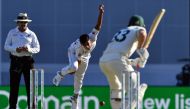 Pakistan's paceman Naseem Shah (C) bowls to Australia's batsman Marnus Labuschagne (R) on day two of the first Test cricket match between Pakistan and Australia at the Gabba in Brisbane on November 22, 2019. -- 
/ AFP / AFP / Saeed KHAN /
