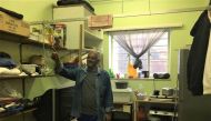 Bevil Lucas, housing activist, points to a shelf in his bedroom in the occupied Woodstock hospital in Cape Town, South Africa, 17 October 2019. Thomson Reuters Foundation/Kim Harrisberg