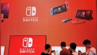 File photo: Visitors are seen at a booth of Nintendo Switch at the China Digital Entertainment Expo and Conference, also known as ChinaJoy, in Shanghai, China August 2, 2019. REUTERS/Pei Li