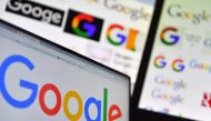 FILE PHOTO: logos of US multinational technology company Google displayed on computers' screens. November 20, 2017.  AFP / LOIC VENANCE