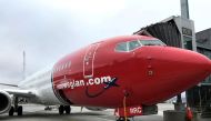 FILE PHOTO: A Norwegian Air plane is refuelled at Oslo Gardermoen airport, Norway November 7, 2019. REUTERS/Lefteris Karagiannopoulos/File Photo