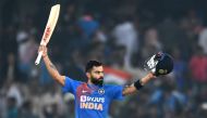 Indian cricket captain virat kohli raise his bat after winning the match against West Indies during the first T20 international cricket match of a three-match series between India and West Indies at the Rajiv Gandhi International Cricket Stadium in Hydera